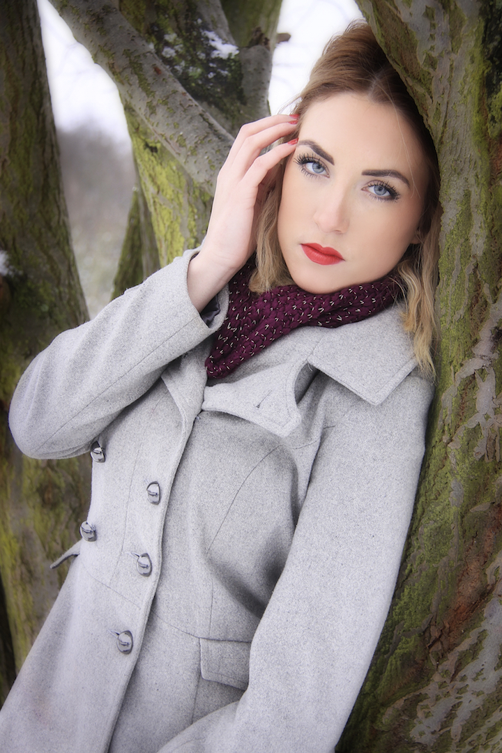 Fashion shot of young woman in winter outfit